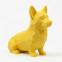 Yellow geometric dog sculpture on a white background